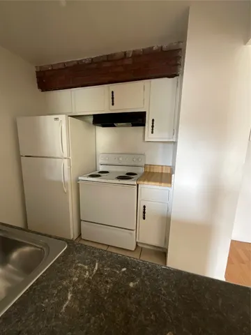 a utility room with washer and dryer