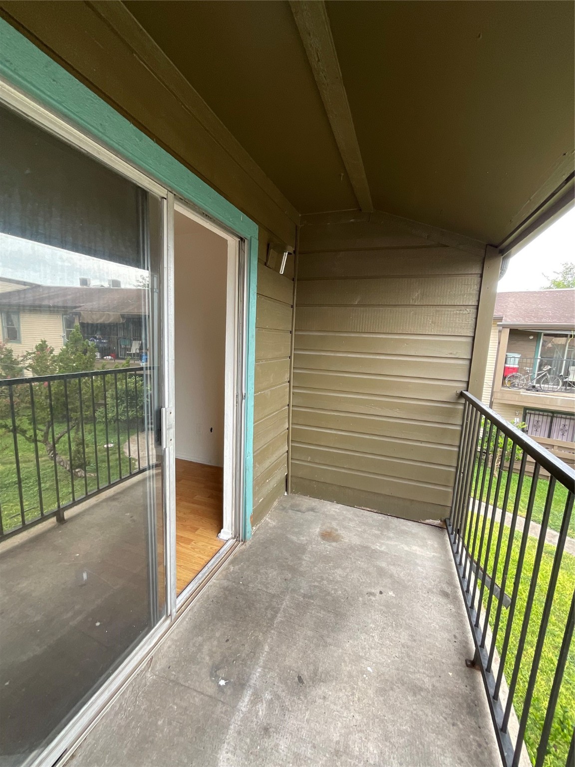 6161 Reims Road, Unit 1305 Houston, TX 77036 - Photo 24 of 28 a view of a porch with wooden floor