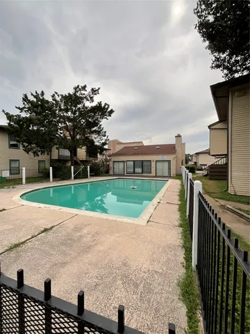 a view of a backyard with a garden