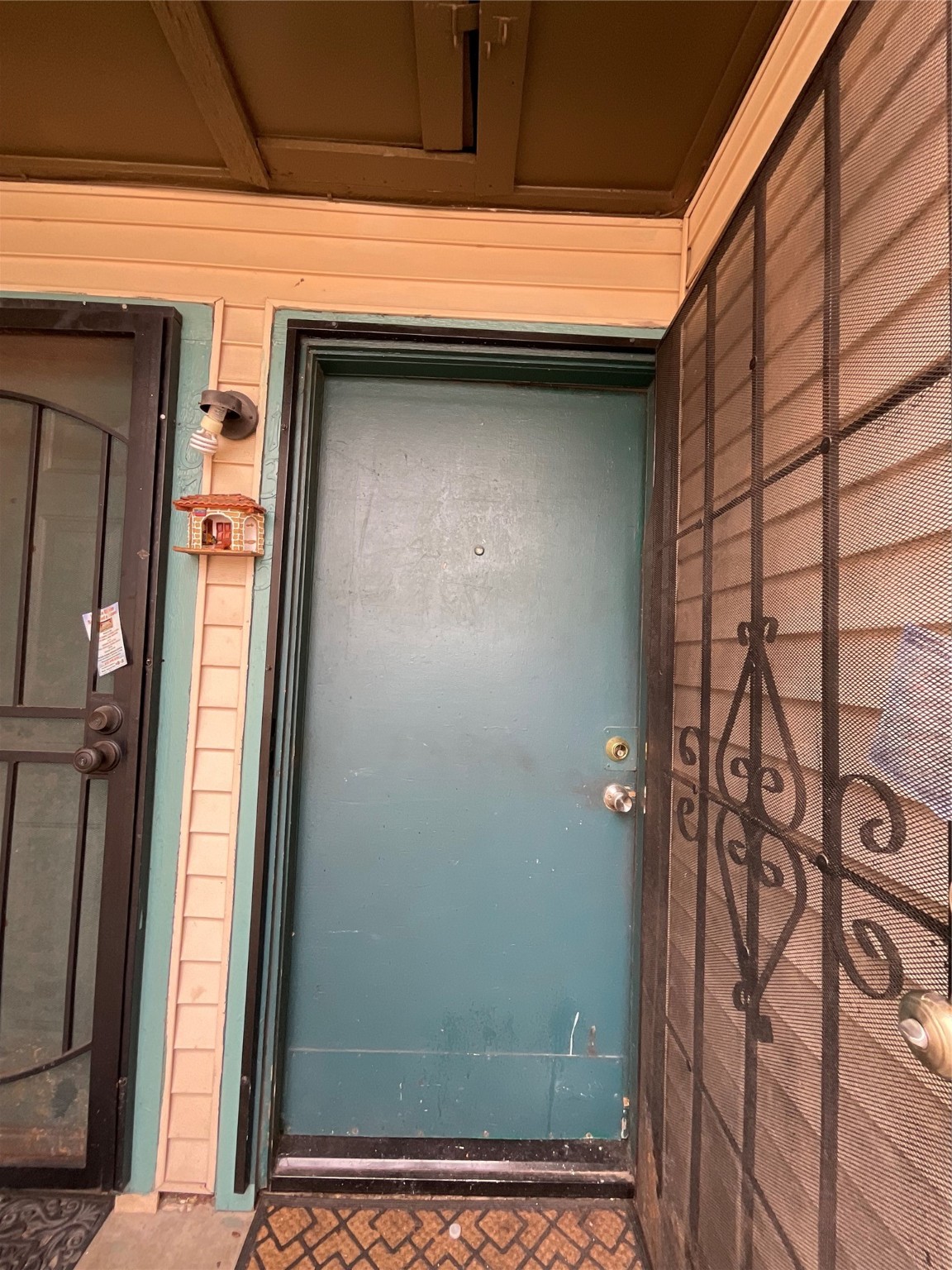 6161 Reims Road, Unit 1305 Houston, TX 77036 - Photo 3 of 28 a view of a door and a window