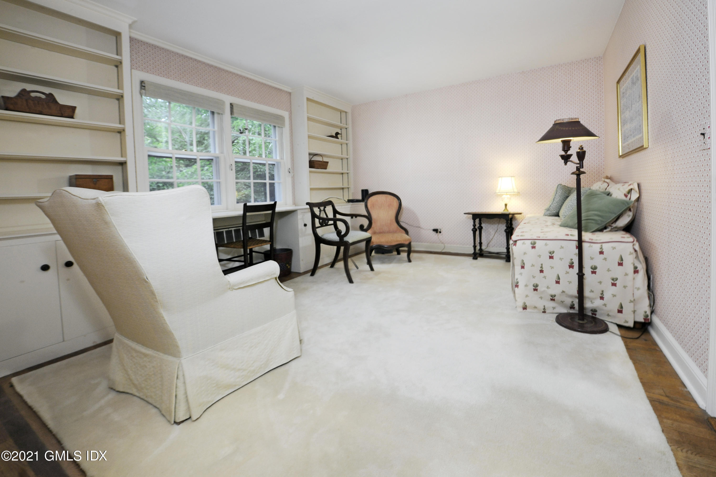 64 Hillside Road Greenwich, CT 06830 - Photo 16 of 24 a living room with furniture and a large window