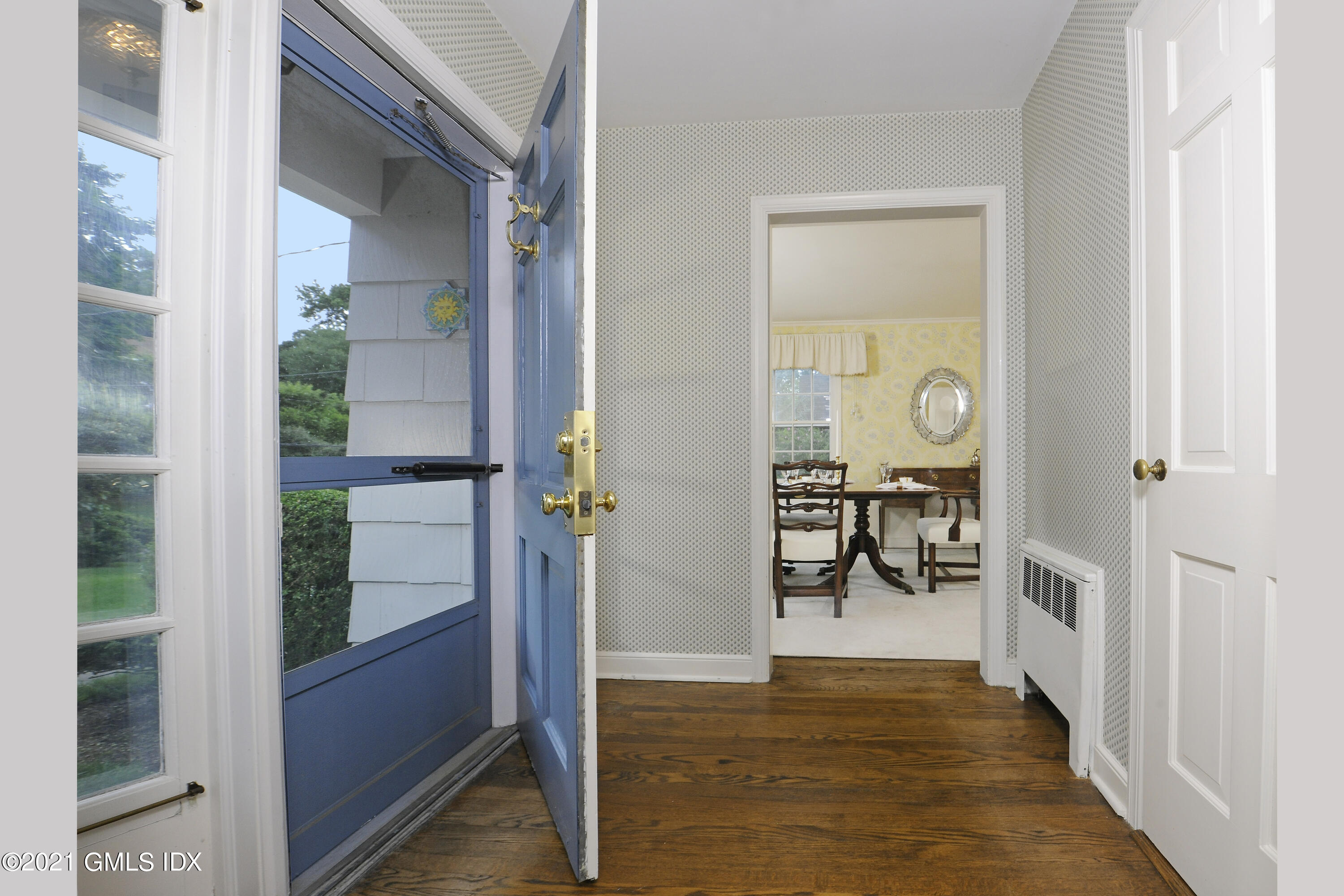 64 Hillside Road Greenwich, CT 06830 - Photo 5 of 24 a view of an entryway door and hallway