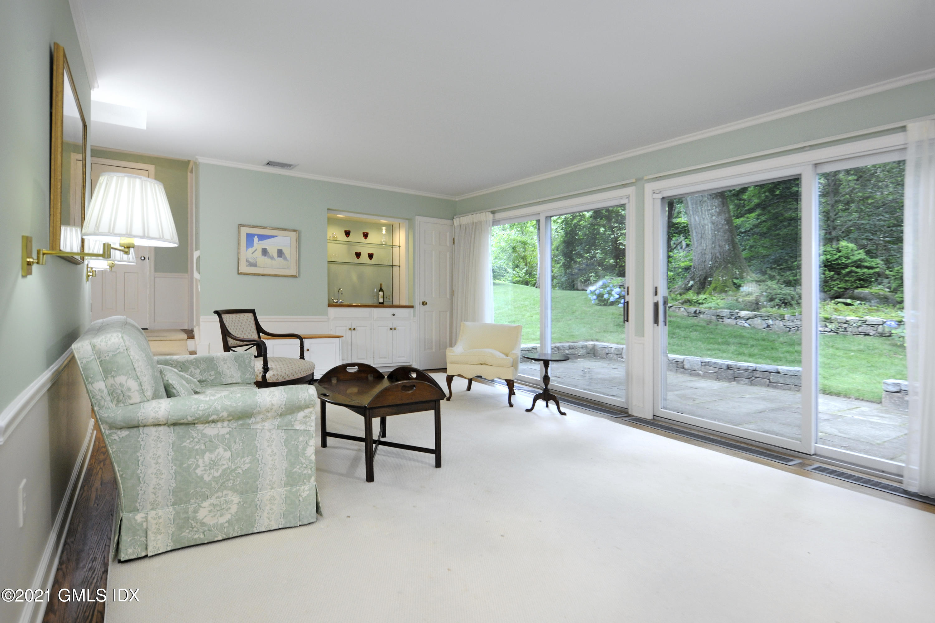 64 Hillside Road Greenwich, CT 06830 - Photo 8 of 24 a living room with furniture and a large window