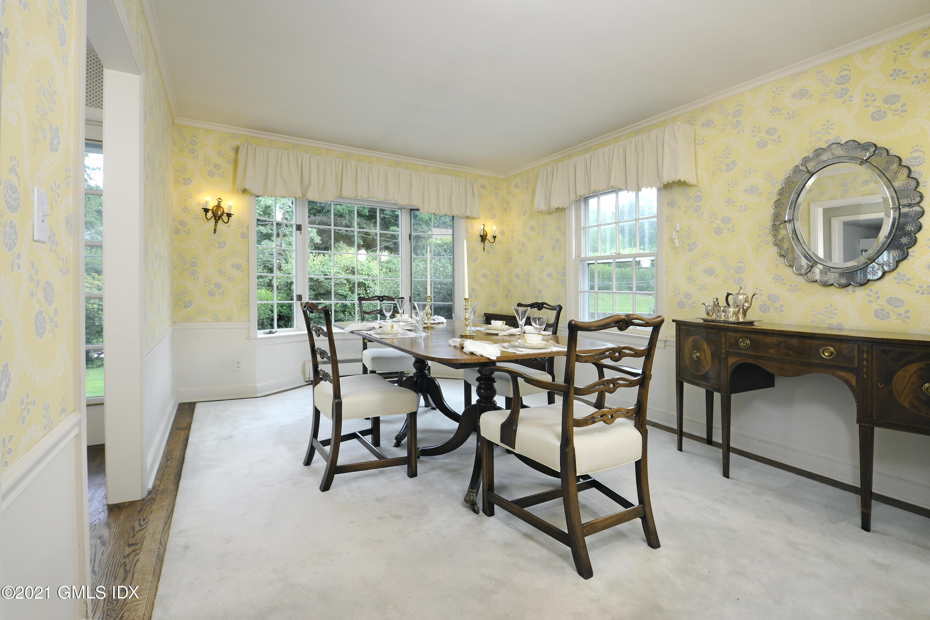 64 Hillside Road Greenwich, CT 06830 - Photo 10 of 24 a view of a dining room with furniture window and outside view