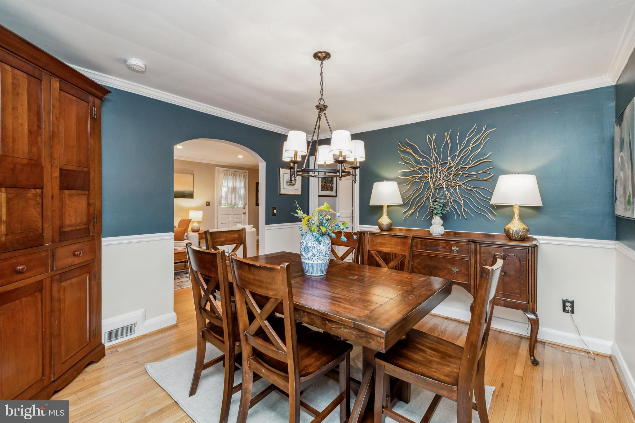 511 Wilton Road Towson, MD 21286 - Photo 5 of 39 a view of a dining room with furniture window and wooden floor