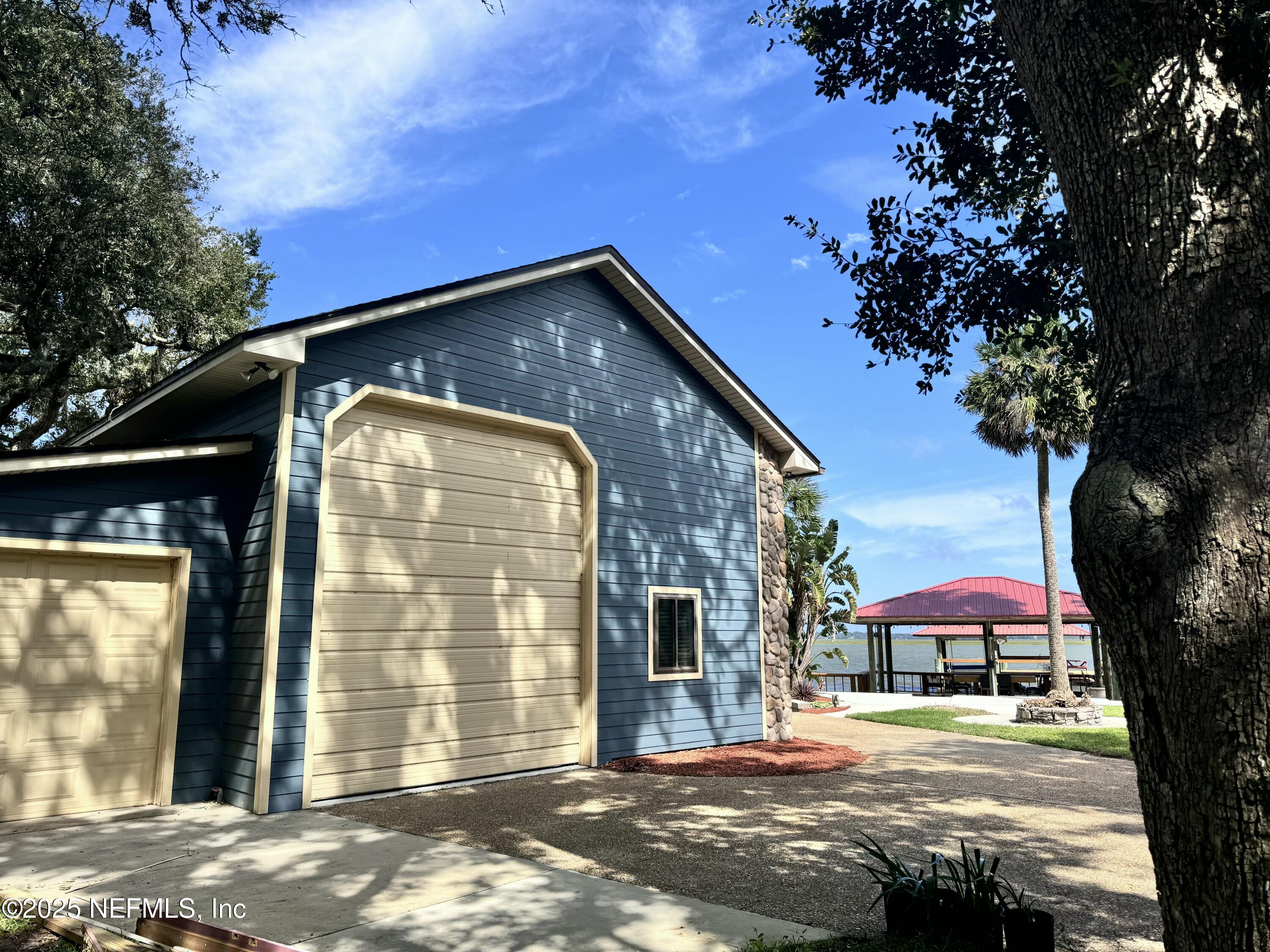 16361 Waterville Road Jacksonville, FL 32226 - Photo 54 of 57 a front view of a house with a yard