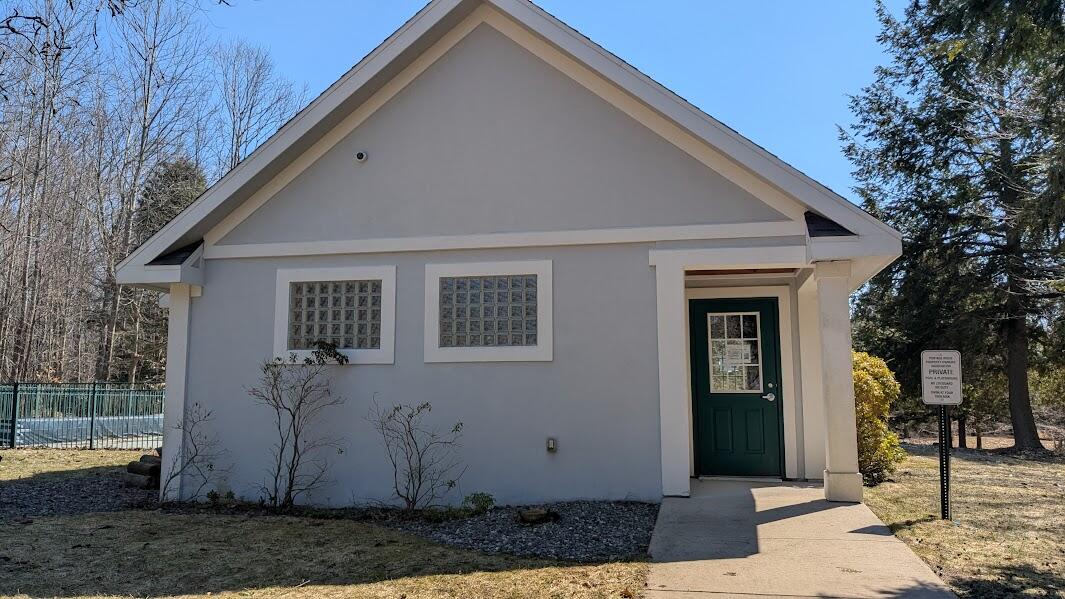 Opal Ridge Drive, Unit 68 Onekama, MI 49675 - Photo 12 of 35 Clubhouse with Pool