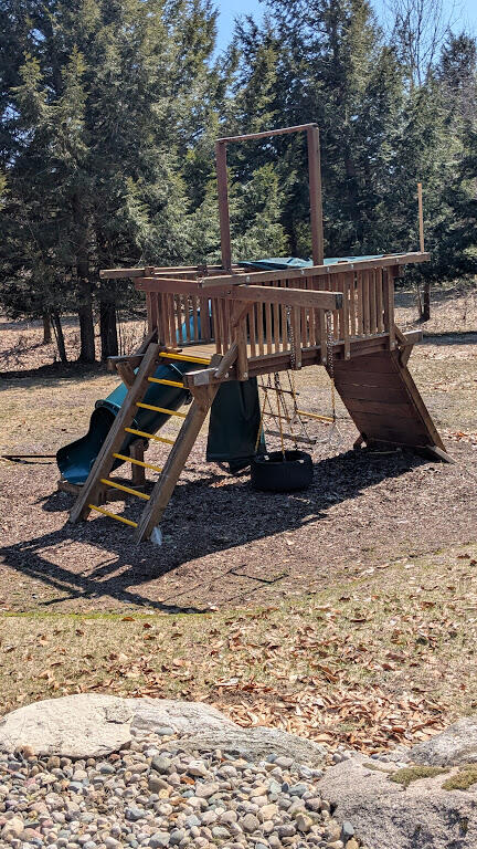 Opal Ridge Drive, Unit 68 Onekama, MI 49675 - Photo 16 of 35 Clubhouse Playground