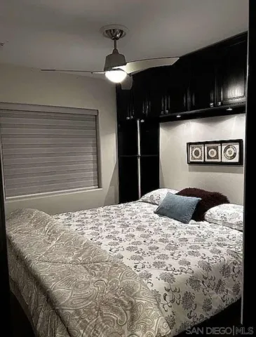 a bathroom with a shower and a toilet