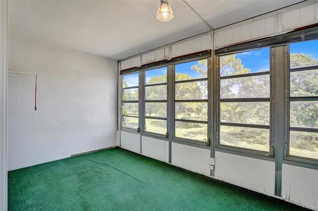 a view of an empty room with window