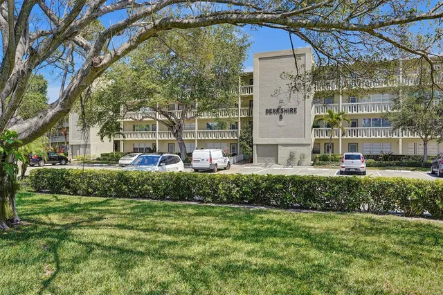a view of a building with a garden