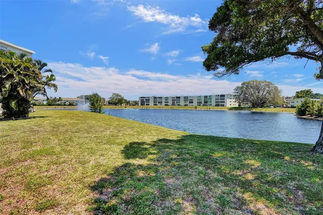 a picture of a bench in front of a wall