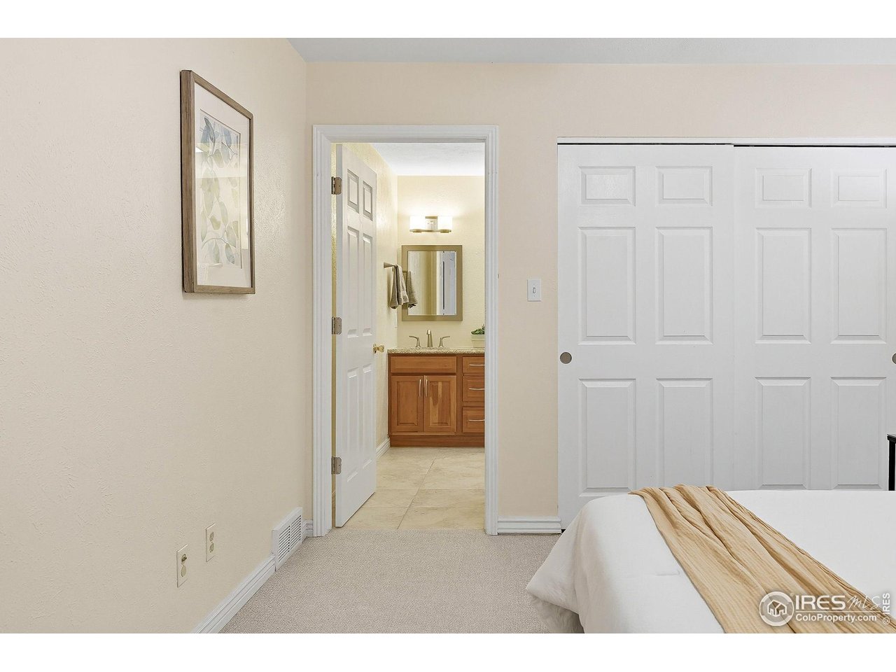 1303 Alpine Avenue, Unit 24 Boulder, CO 80304 - Photo 20 of 46 a view of a bedroom from the hallway