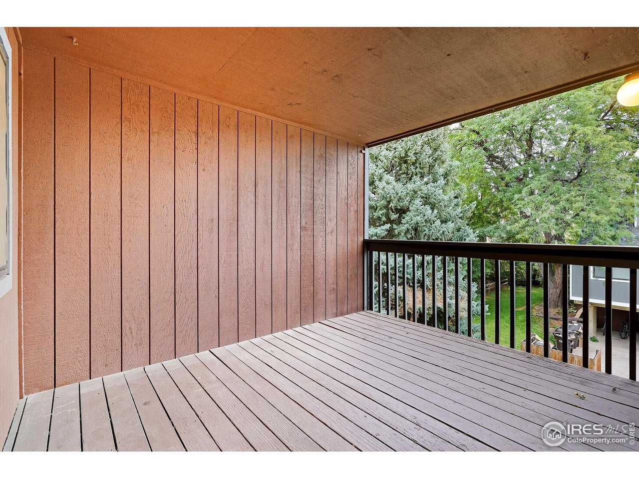 1303 Alpine Avenue, Unit 24 Boulder, CO 80304 - Photo 6 of 46 a view of wooden balcony