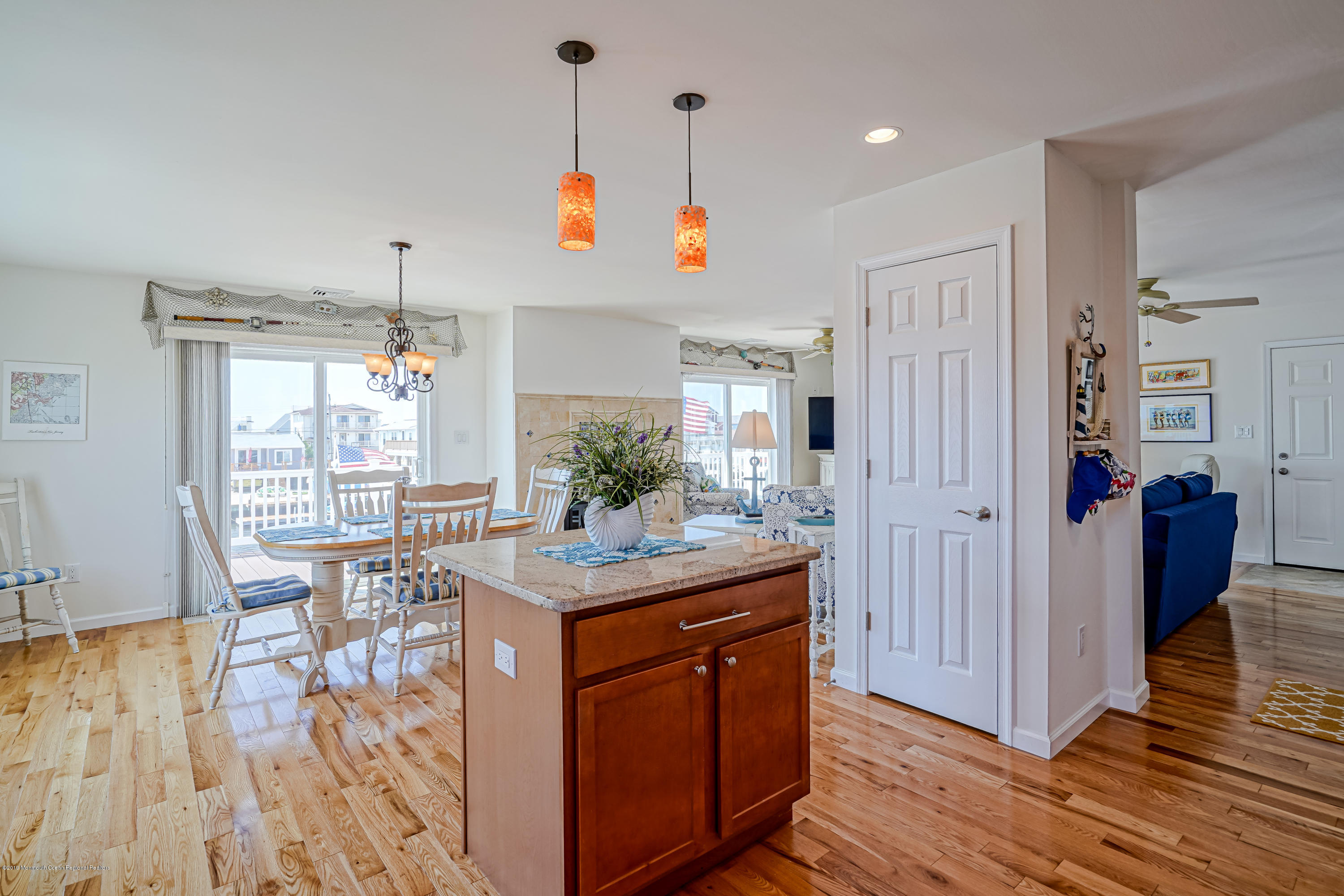 341 Kingfisher Road Tuckerton, NJ 08087 - Photo 14 of 38 a kitchen with stainless steel appliances granite countertop a stove and wooden floor