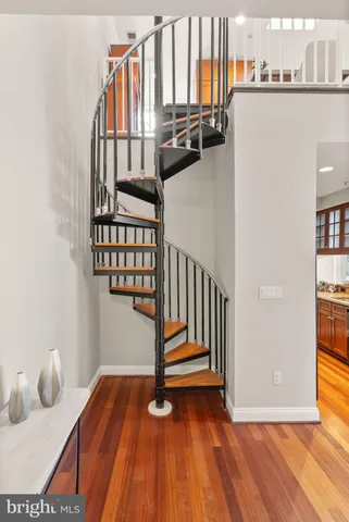 a view of entryway with wooden floor