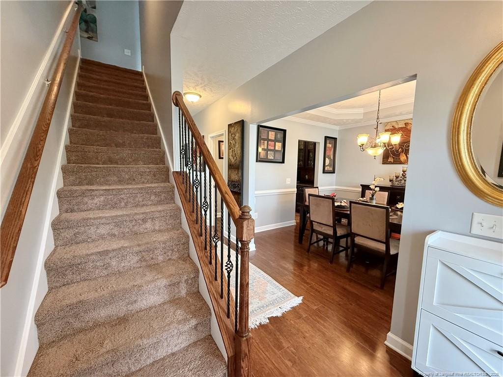 35 Ambrose Point Cameron, NC 28326 - Photo 6 of 31 a view of entryway and hall with wooden floor