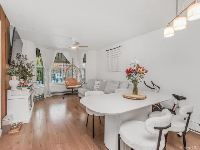 a living room with furniture and a table
