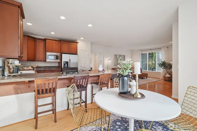 a view of a dining room with furniture window and outside view