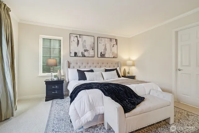 a bathroom with a double vanity sink mirror and shower