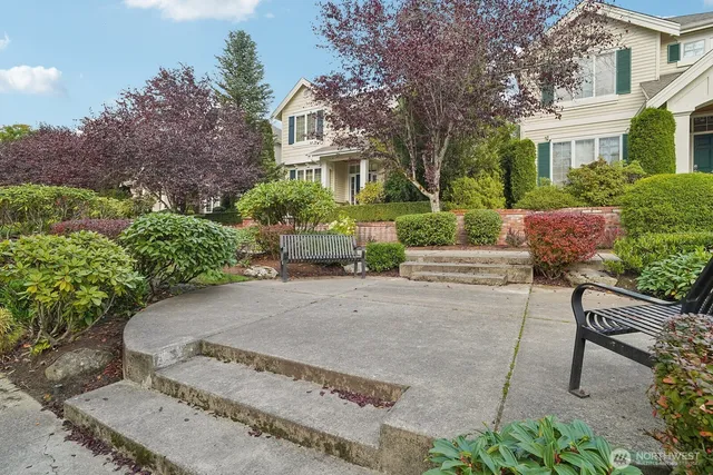 an aerial view of a golf course with parking space