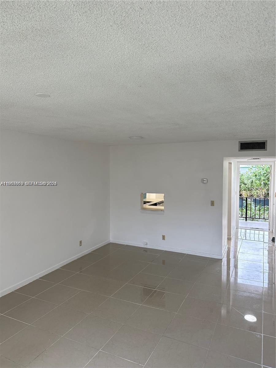 200 Ashbury Road, Unit 209 Hollywood, FL 33024 - Photo 4 of 18 a view of a room