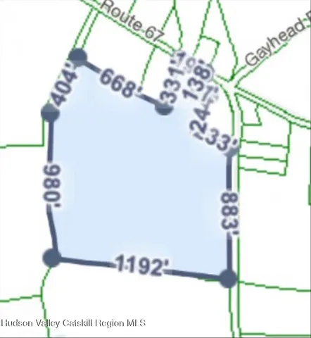 a picture of a glass door with a white vase and a vase of flowers