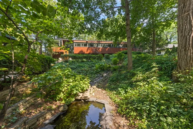 a view of outdoor space with deck and tree
