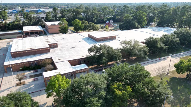 a view of swimming pool with a garden