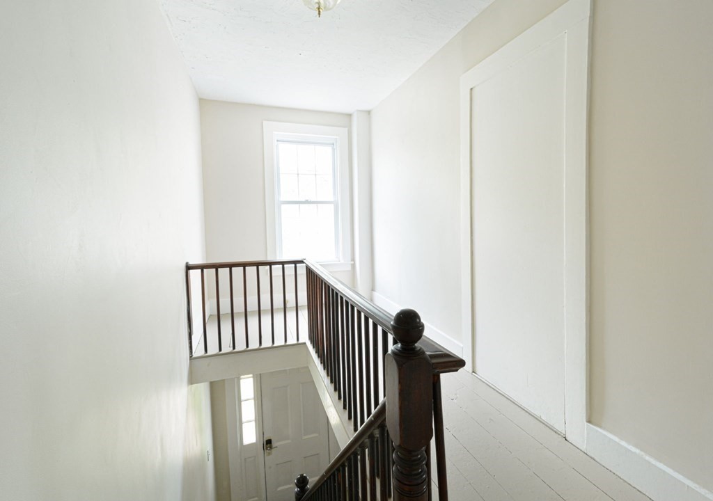 8 Myrtle Street Westborough, MA 01581 - Photo 11 of 35 a view of entryway with wooden floor