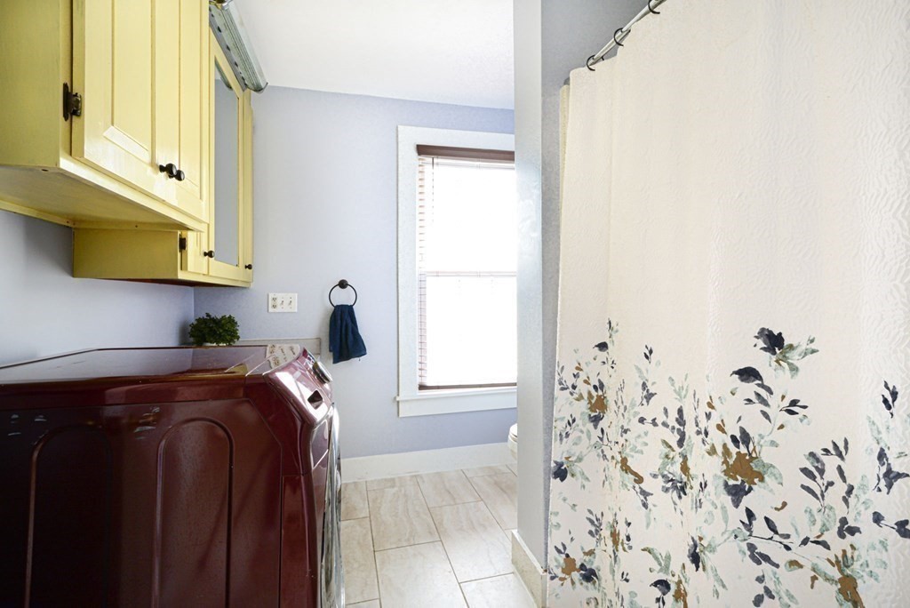 8 Myrtle Street Westborough, MA 01581 - Photo 16 of 35 a bedroom with a bed and a window