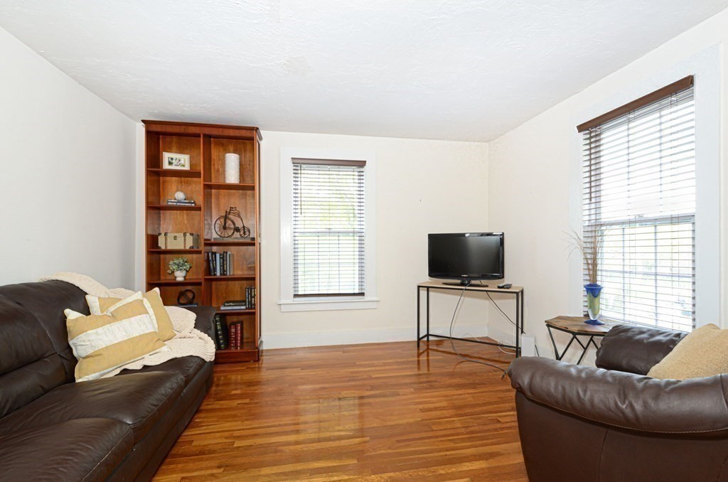 8 Myrtle Street Westborough, MA 01581 - Photo 23 of 35 a living room with furniture and a flat screen tv