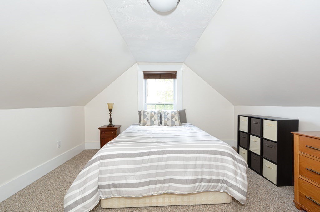 8 Myrtle Street Westborough, MA 01581 - Photo 28 of 35 a bedroom with a bed and a window