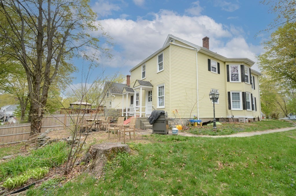 8 Myrtle Street Westborough, MA 01581 - Photo 34 of 35 a backyard of a house with table and chairs