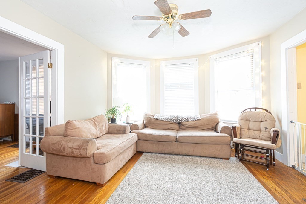 8 Myrtle Street Westborough, MA 01581 - Photo 4 of 35 a living room with furniture and a large window