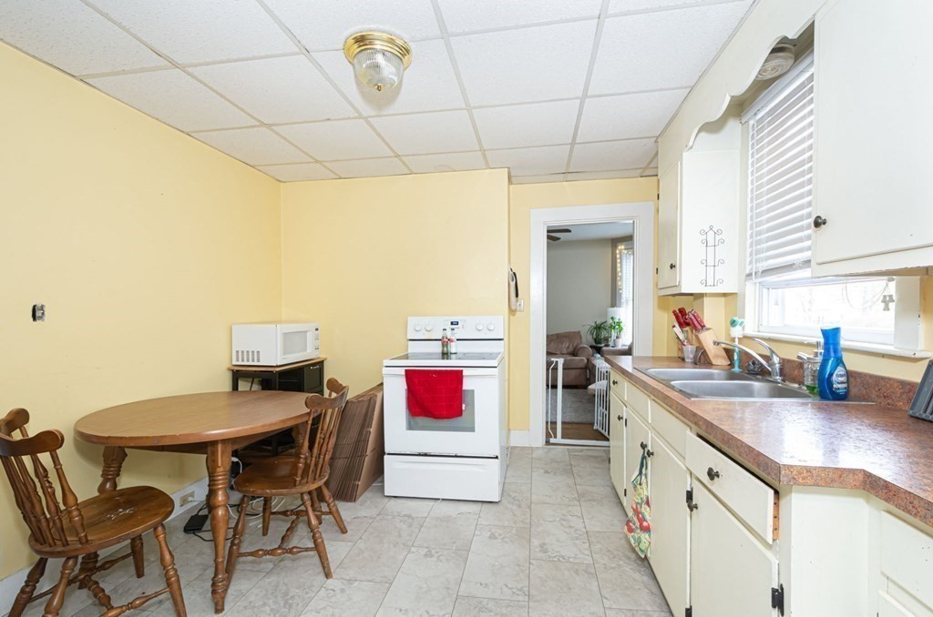 8 Myrtle Street Westborough, MA 01581 - Photo 6 of 35 a kitchen with a sink cabinets and counter space