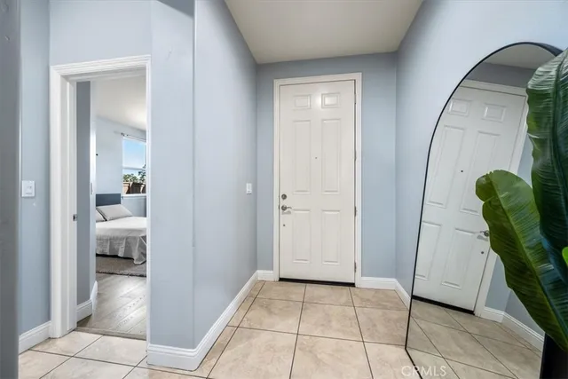 a bathroom with a shower sink and mirror