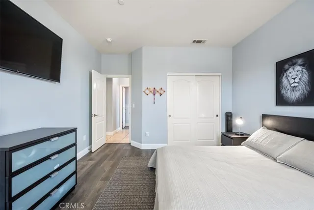 a view of a hallway and a livingroom