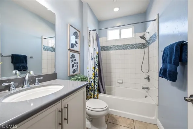 a bedroom with a bed and furniture