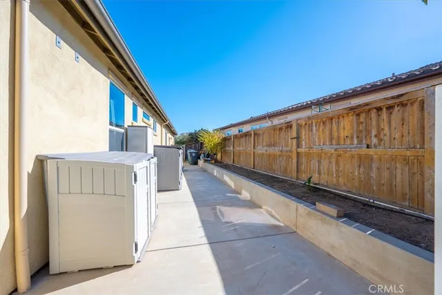 a view of a backyard with a small cabin