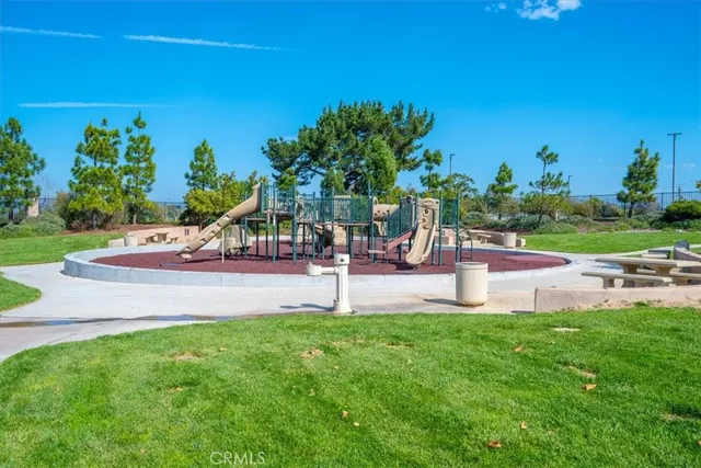 a view of a balcony with wooden fence and floor
