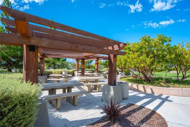 a backyard of a house with lots of green space and garden