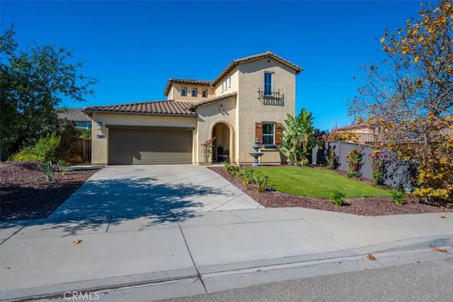 a view of a garden with a tree