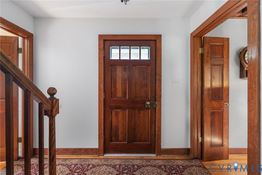 7381 McClellan Road Mechanicsville, VA 23111 - Photo 31 of 66 a view of front door with wooden floor