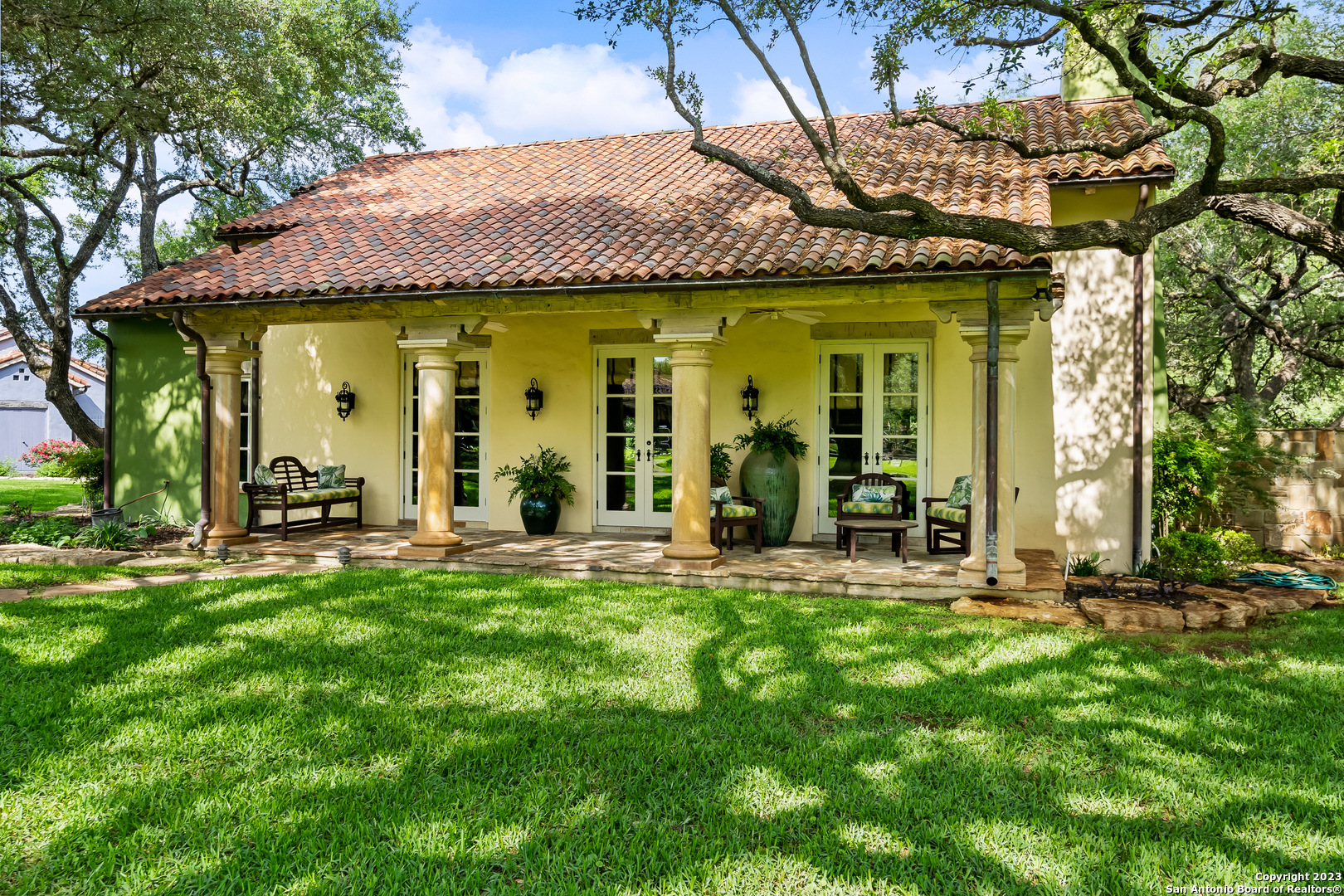 124 Highway 46 Boerne, TX 78006 - Photo 26 of 32 a front view of a house with swimming pool and furniture