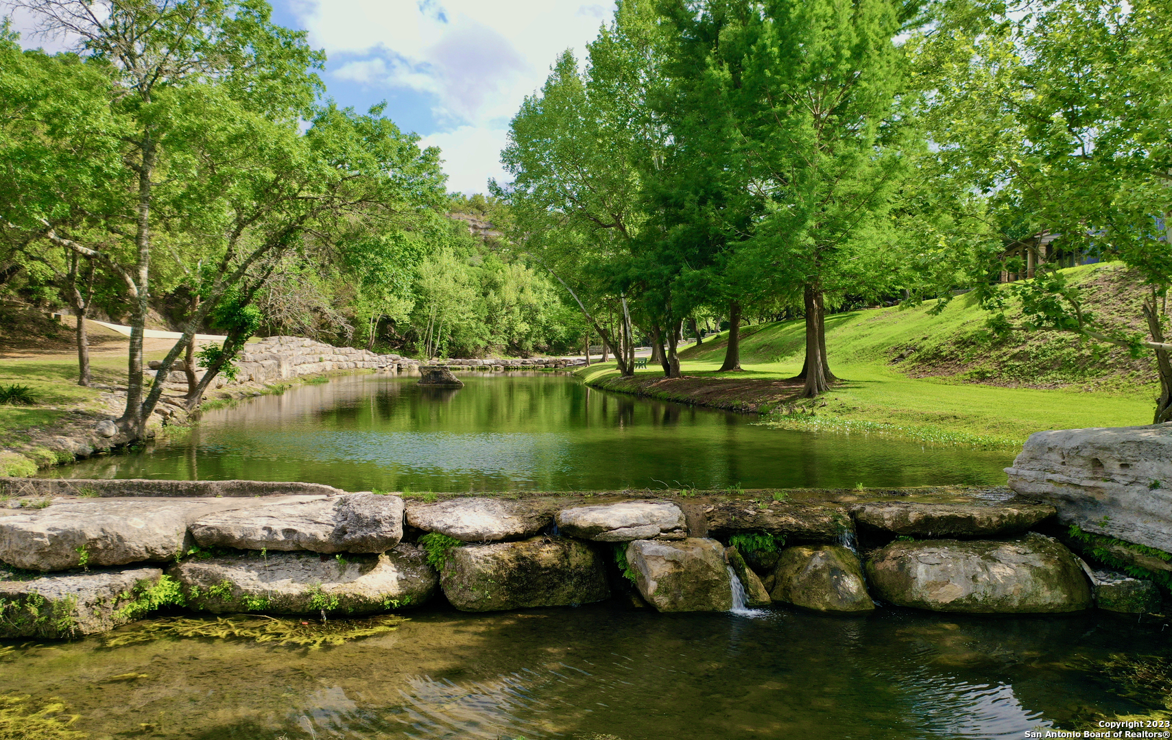 124 Highway 46 Boerne, TX 78006 - Photo 6 of 32 a view of a lake with houses
