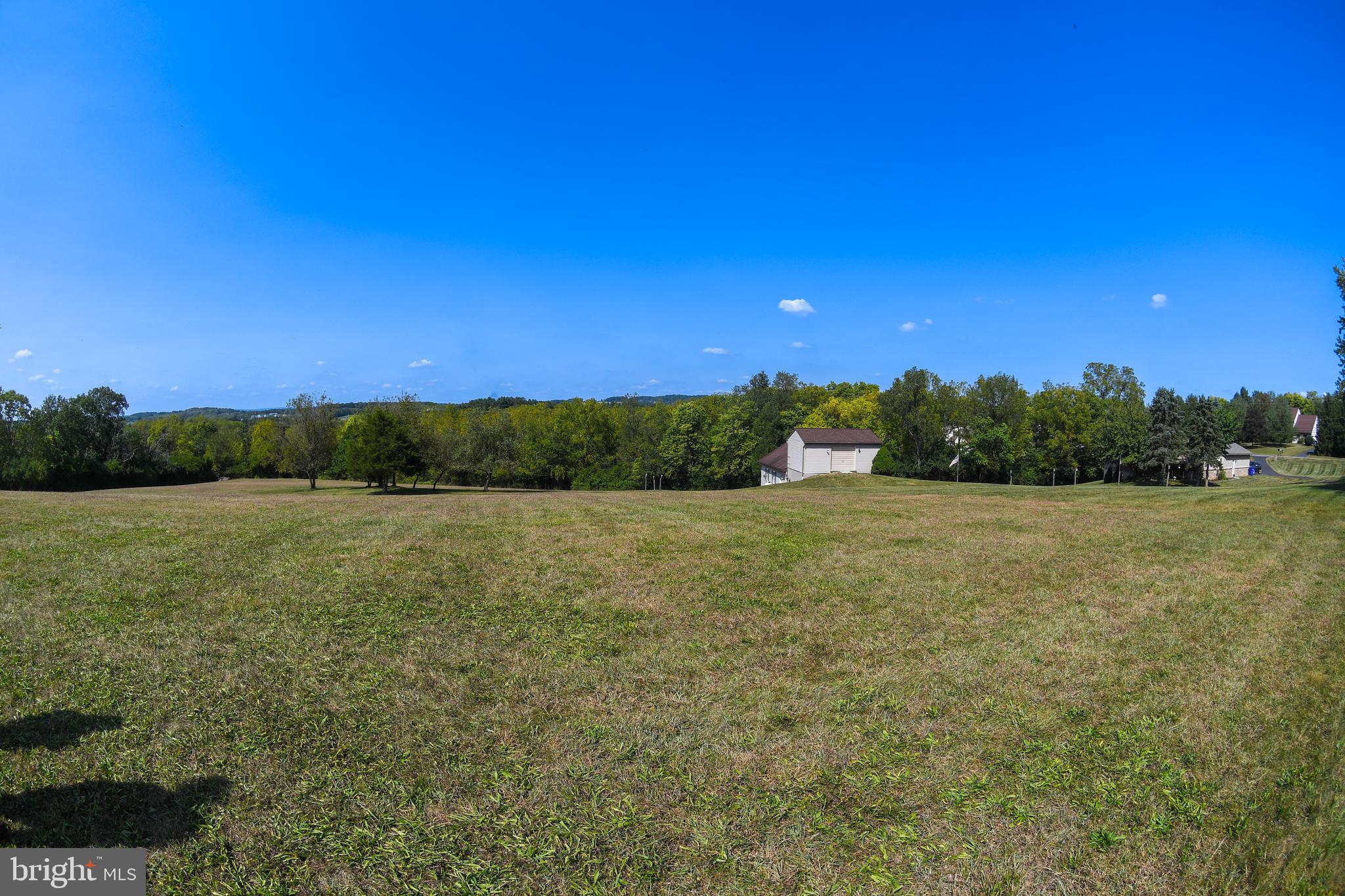1070 Hilltop Road Leesport, PA 19533 - Photo 30 of 33 View of meadow with barn and house to the left