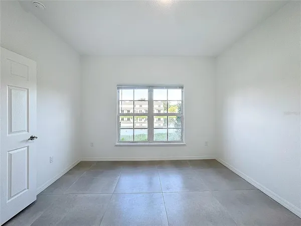 a bathroom with a double vanity sink and mirror