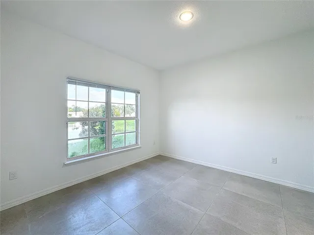 a bathroom with a shower a toilet and a sink