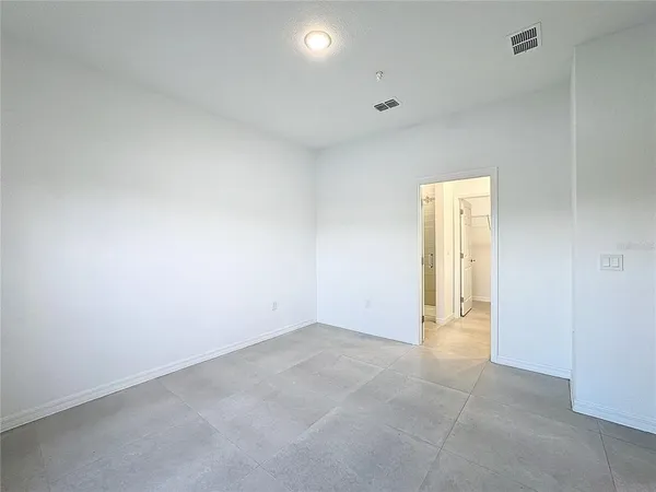 wooden floor and closet in a room